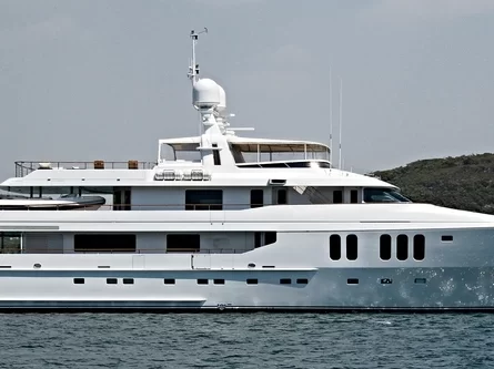 45m superyacht cruising through the water.