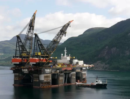 Offshore lift platform beside an island.